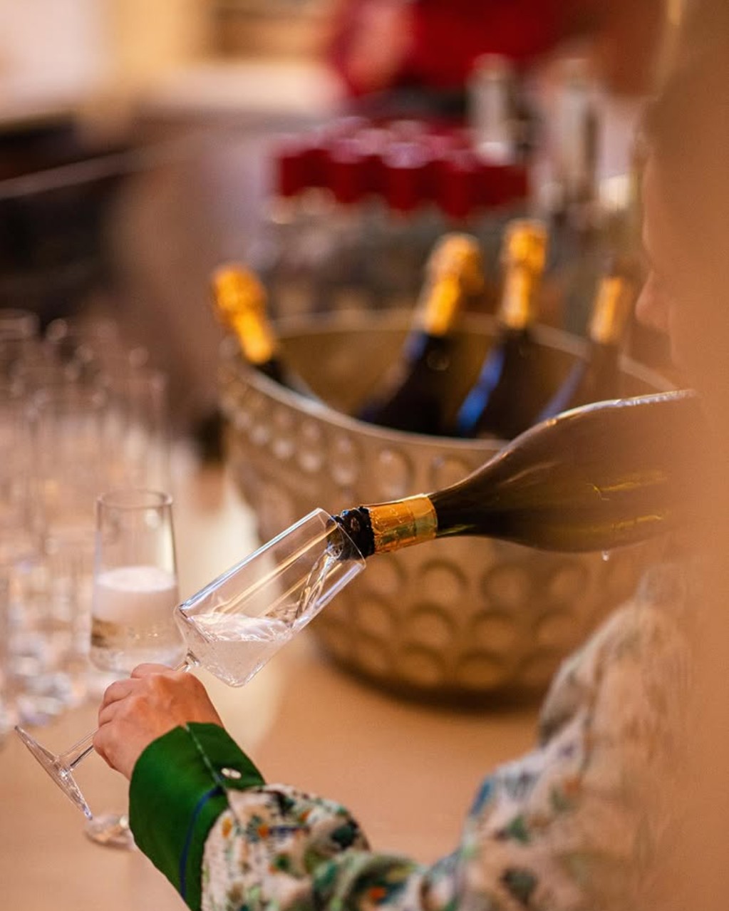 Sparkling wine being poured at the SIX bar