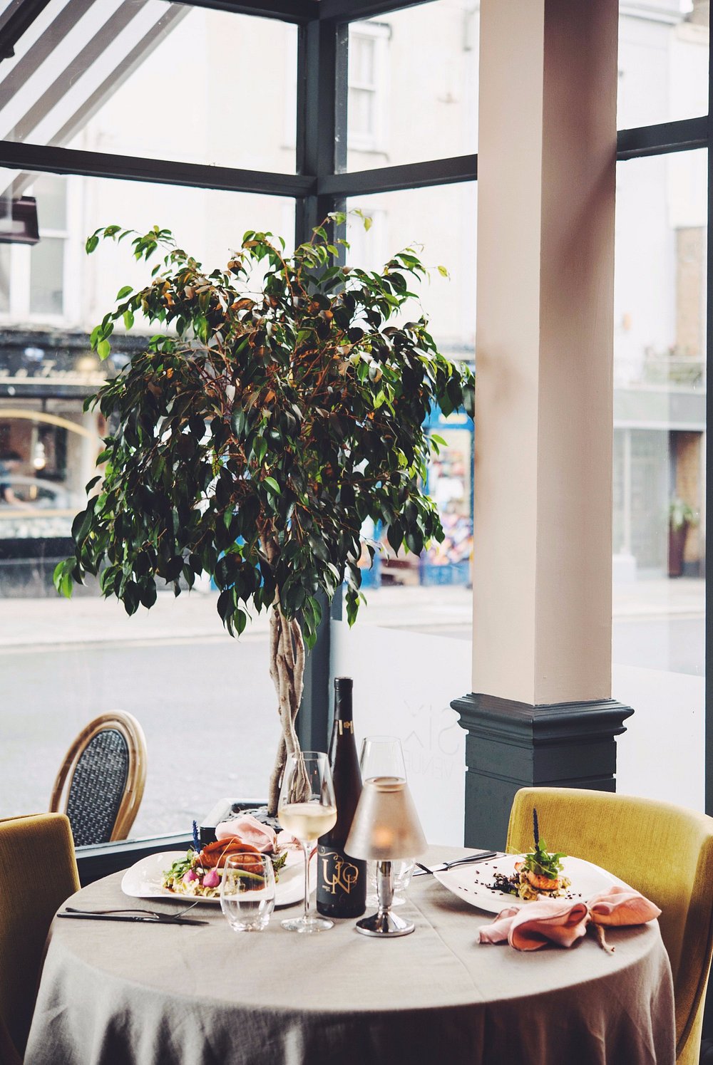 A table by the window at SIX