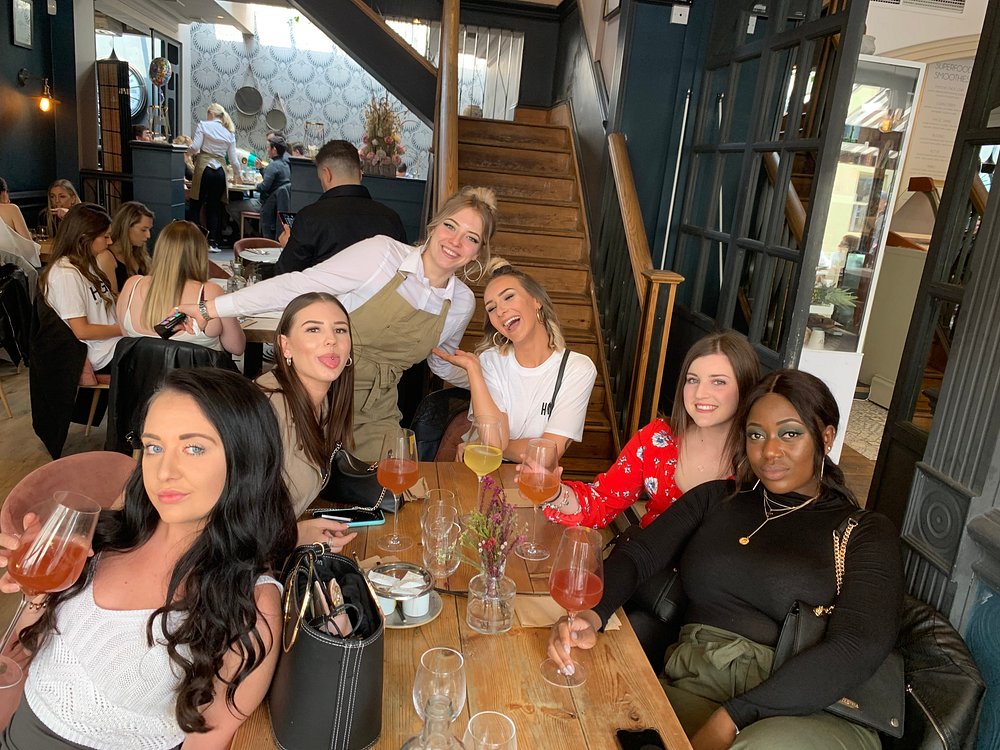 A lively afternoon gathering with the SIX team in the dining room