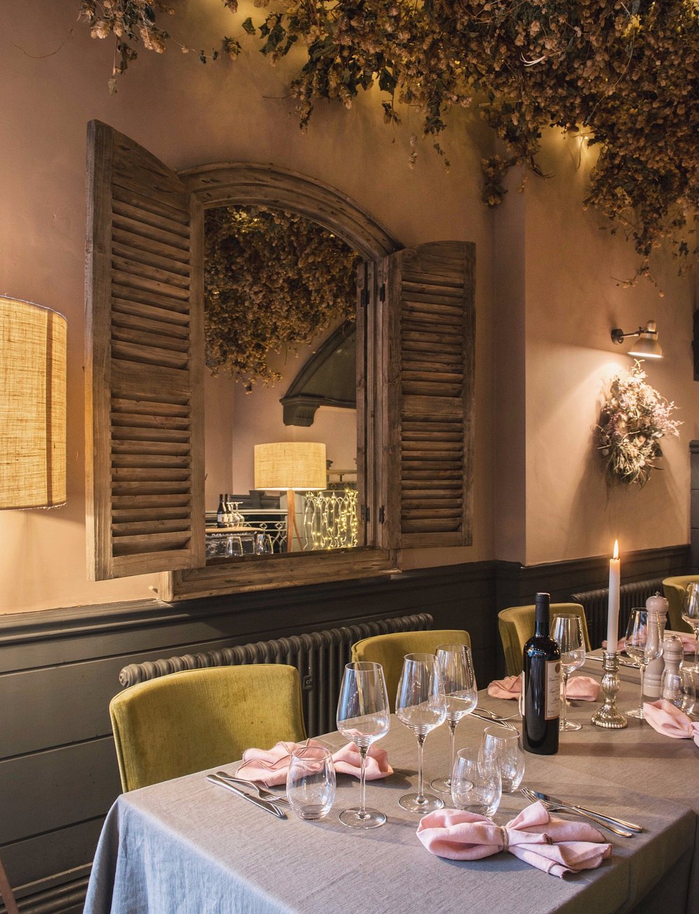 An intimate candlelit table at SIX